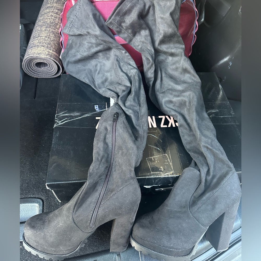 Over the knee black boots